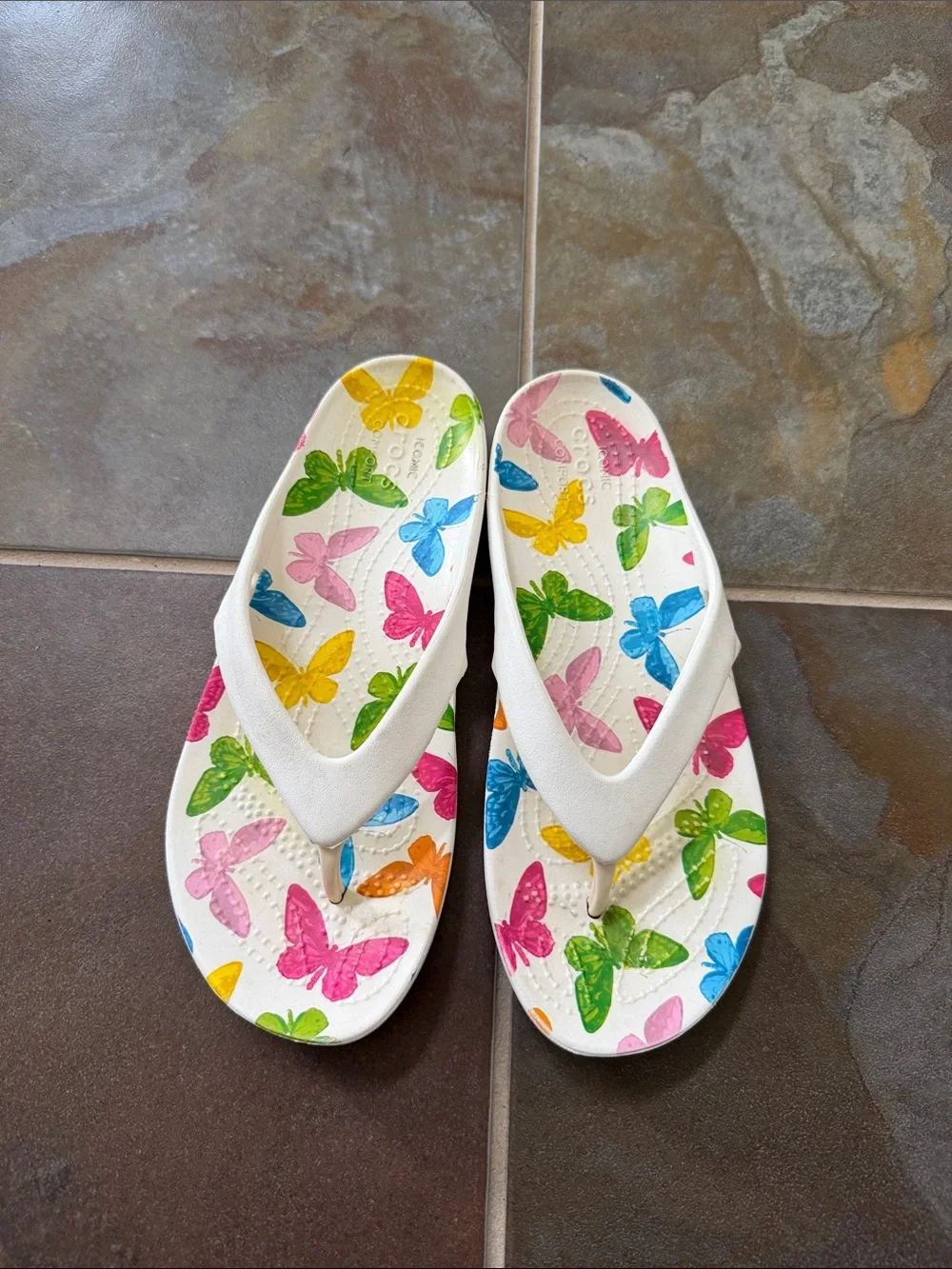 Crocs Kids White Flip Flops with Multicolor Butterfly Print